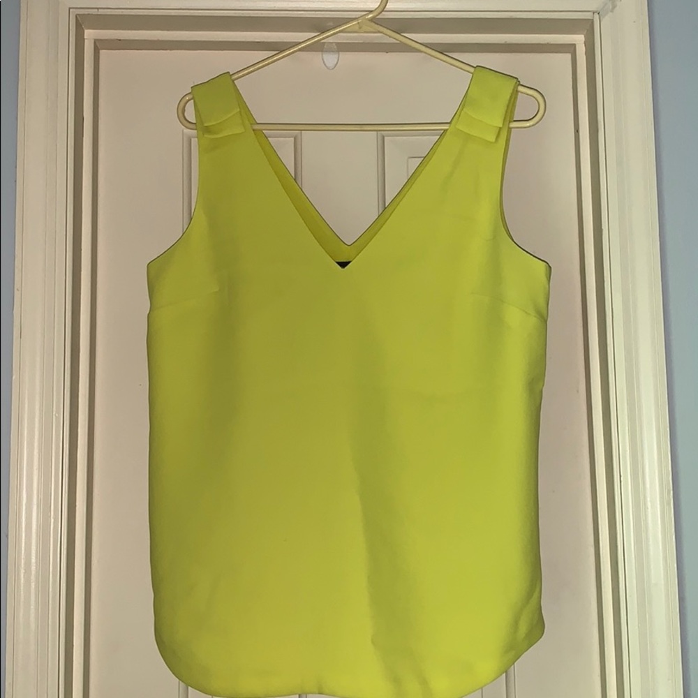 Chartreuse sleeveless top.